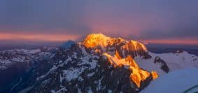 snow covered mountain during daytime